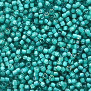 Miyuki Perlen 11/0 delica's White lined teal AB DB-1782