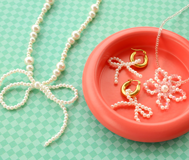 Atemberaubende Statement-Anh&auml;nger: Perlenschleifen