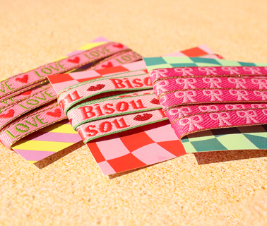 Neue BY31&reg; B&auml;nder mit Text und Stopperperlen