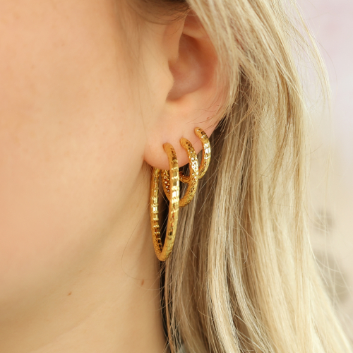 Creolen und Gliederketten-Ohrringe: Entdecke Sie Ihre kreative Seite!